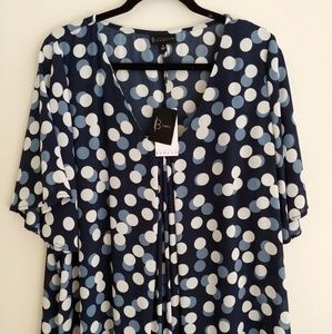 Never worn deep v polka dot flow top